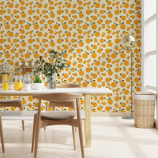 a dining area with a table and chairs, a vase of flowers, and a lamp. The wall behind the table has a repeating pattern of orange and green circles, creating a vibrant and lively atmosphere.