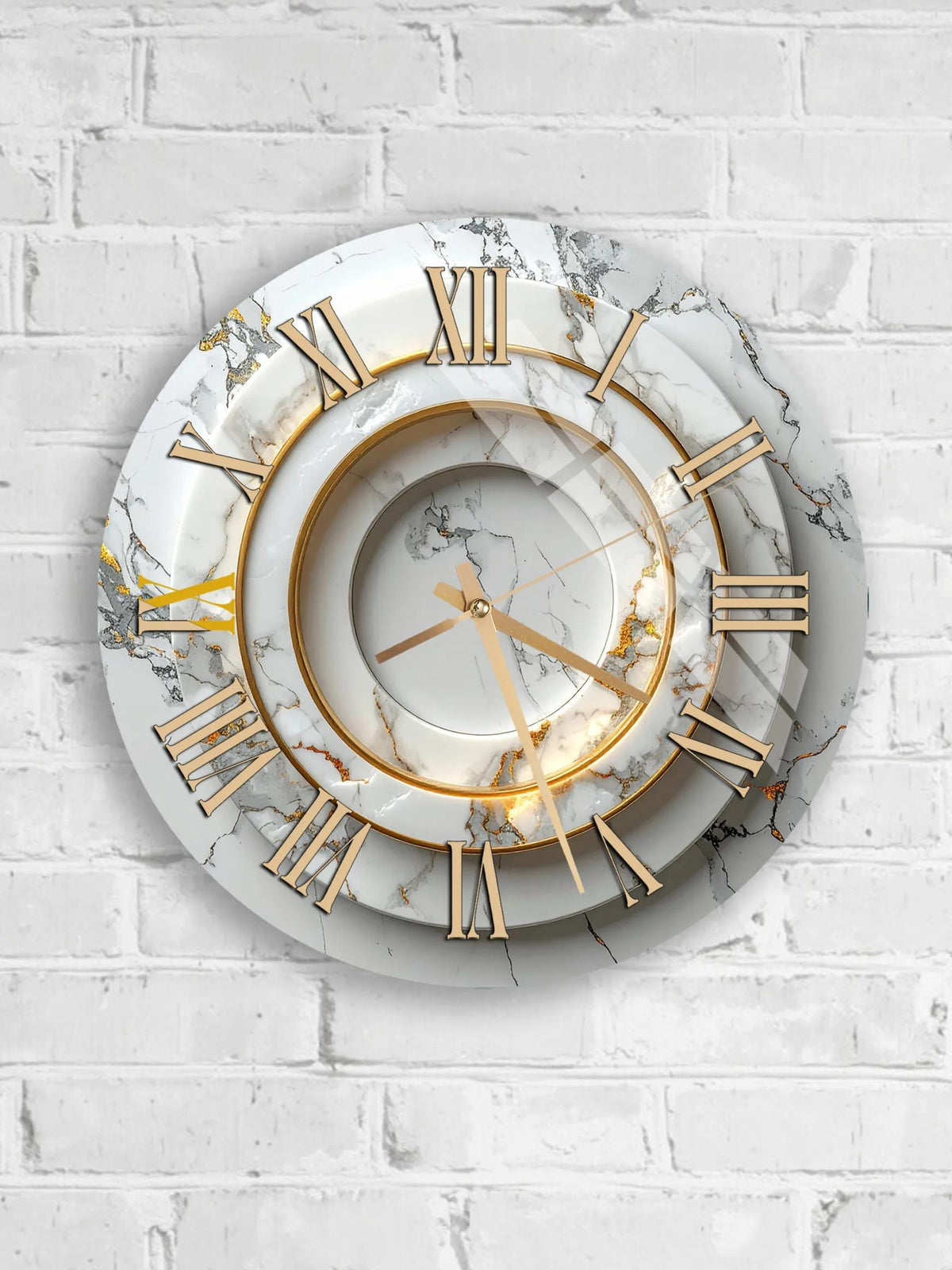 A white marble wall clock with gold Roman numerals and hands.