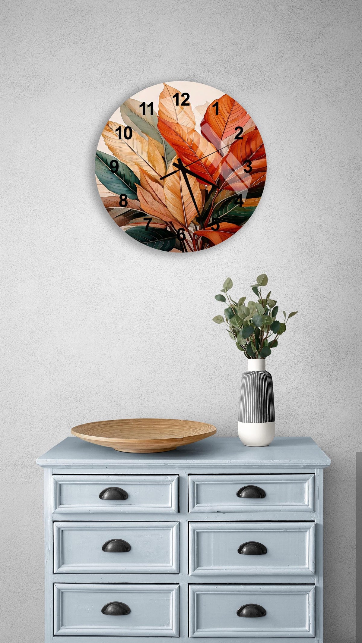 a clock on a wall above a dresser