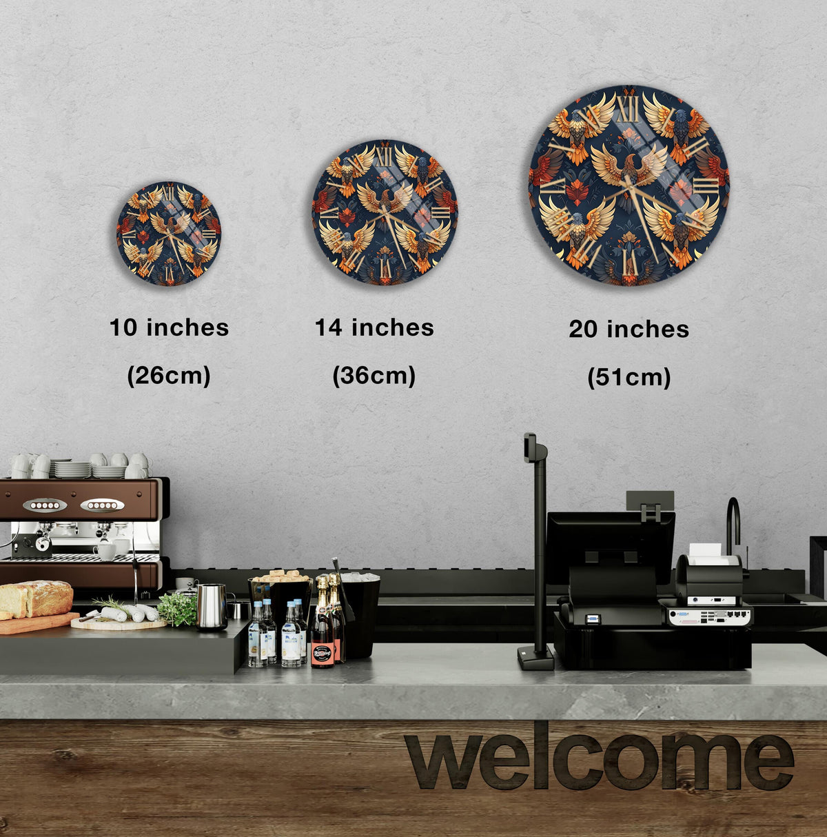 a counter in a restaurant with a welcome sign, and there are three different sizes of round wall clocks displayed above the counter.