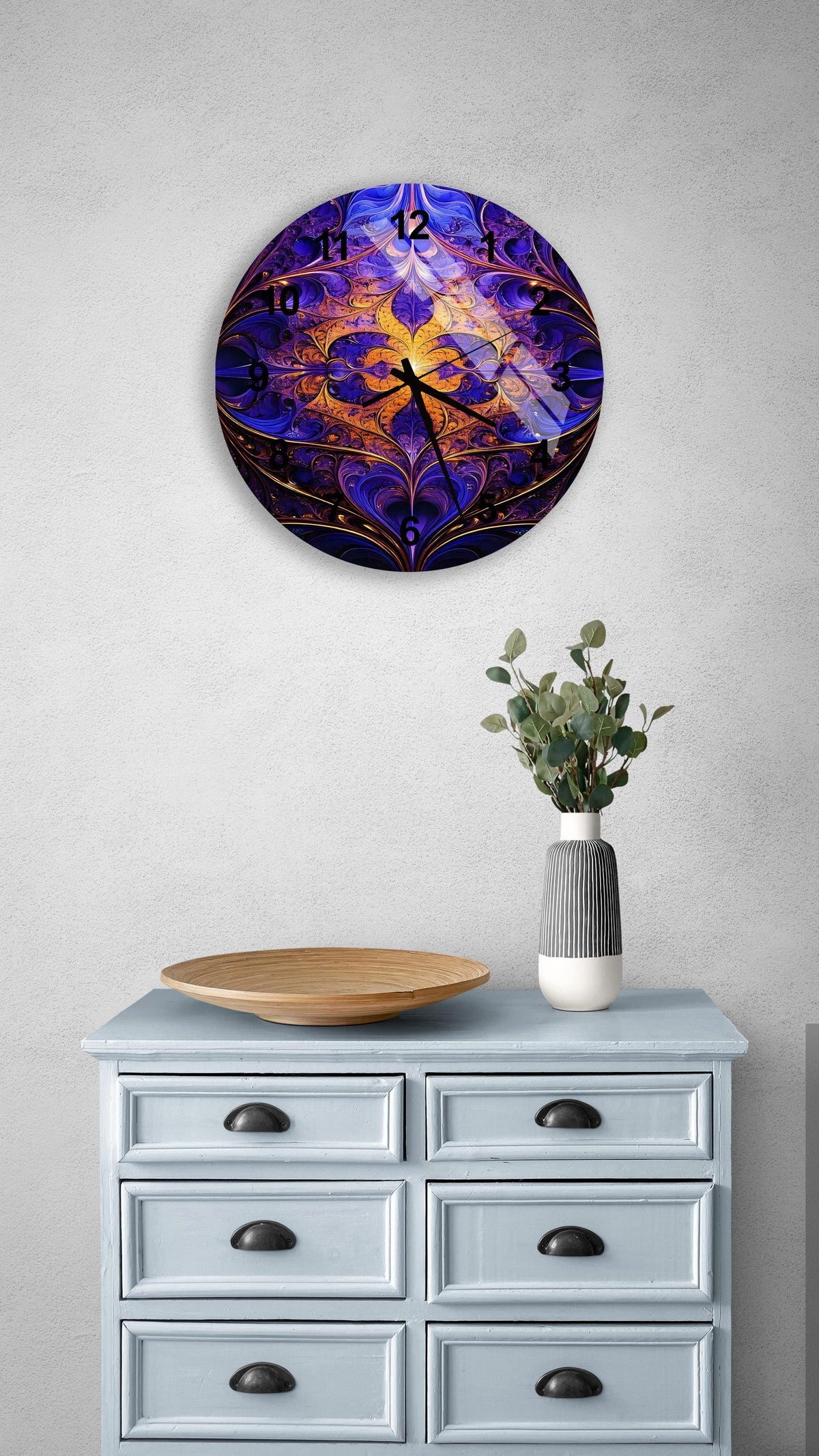 a blue dresser with a wooden bowl on top of it
