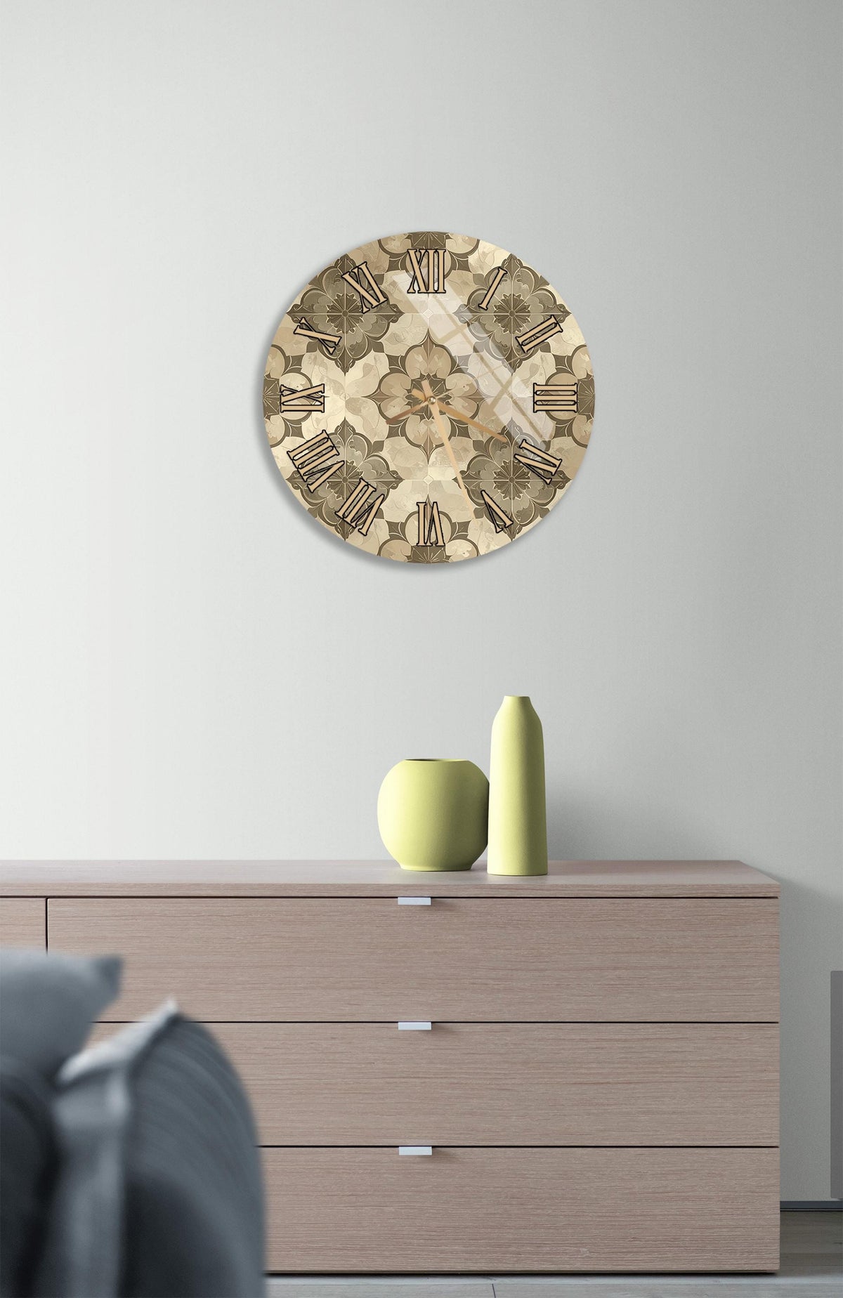 a modern living room with a wooden dresser, a round clock with a floral pattern, and a yellow vase on the dresser.