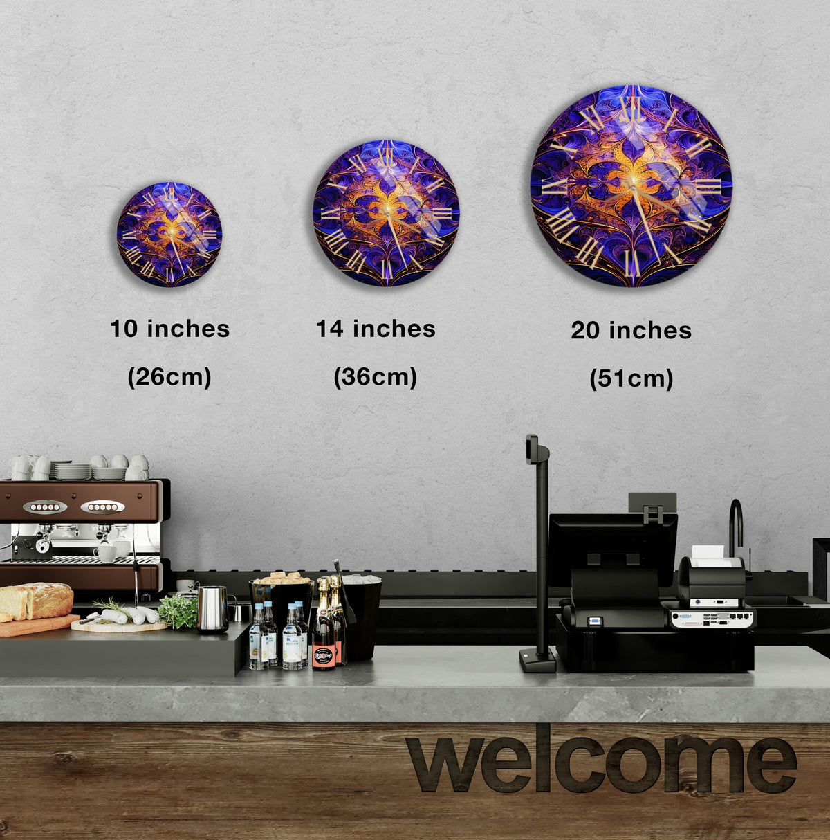 a kitchen counter with three clocks on the wall above it