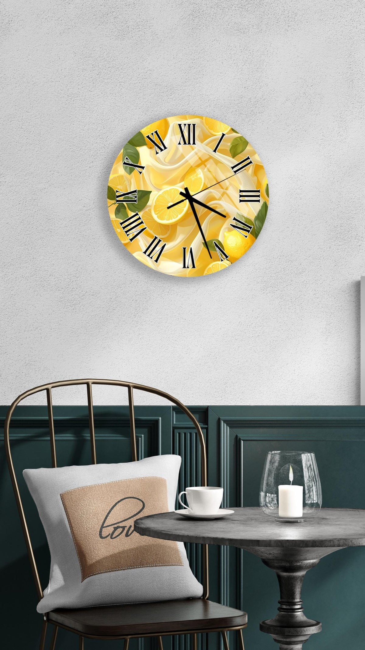 a wall clock with a yellow and green design, hanging on a wall above a table with a white tablecloth.