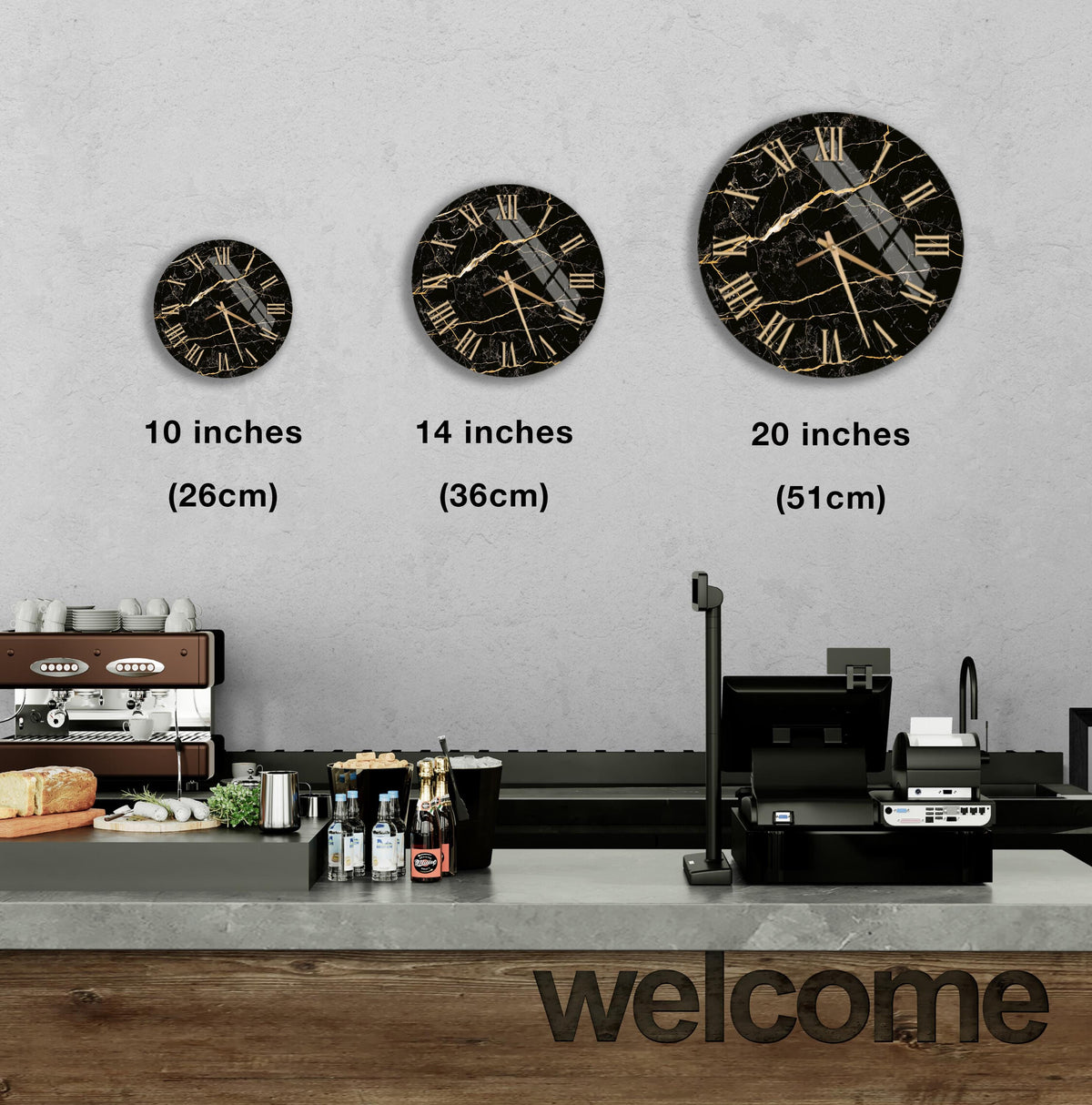 a counter with a cash register, a coffee machine, and a display of various items such as bottles and bread. Above the counter, there are three clock faces of different sizes, each with a black and gold design. The image also includes text indicating the sizes of the clock faces in inches.
