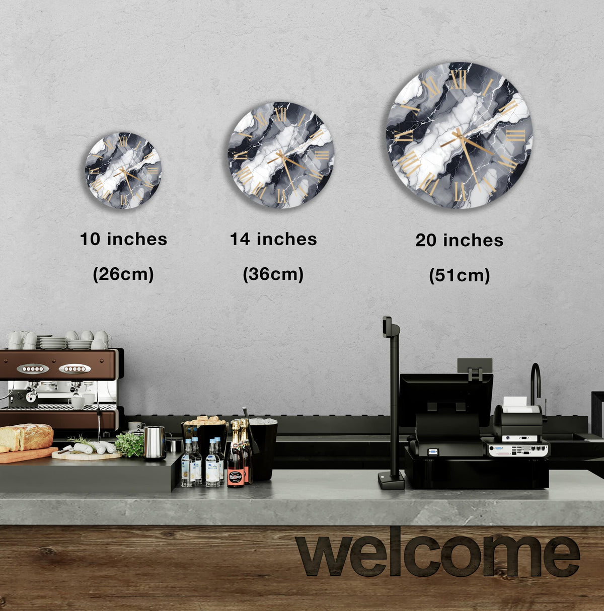 a counter with a cash register, a coffee machine, and a display of various items such as bottles and bread. Above the counter, there are three clock designs, each representing a different size: 10 inches, 14 inches, and 20 inches. The image also includes text indicating the sizes of the clocks, with the words "10 inches (26cm)", "14 inches (36cm)", and "20 inches (51cm)" placed above each clock.