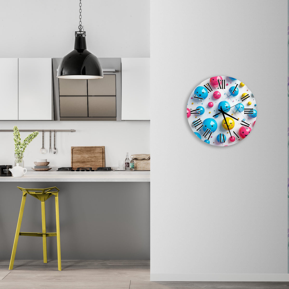 a kitchen with a colorful clock on the wall, a yellow stool, and a hanging light fixture.