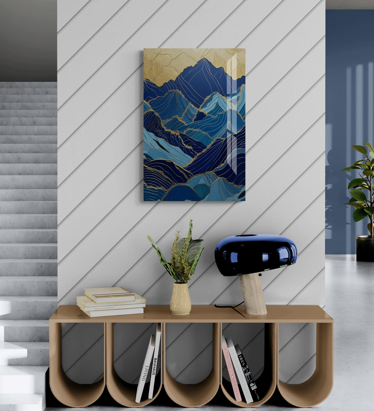 a painting on a wall next to a shelf with books