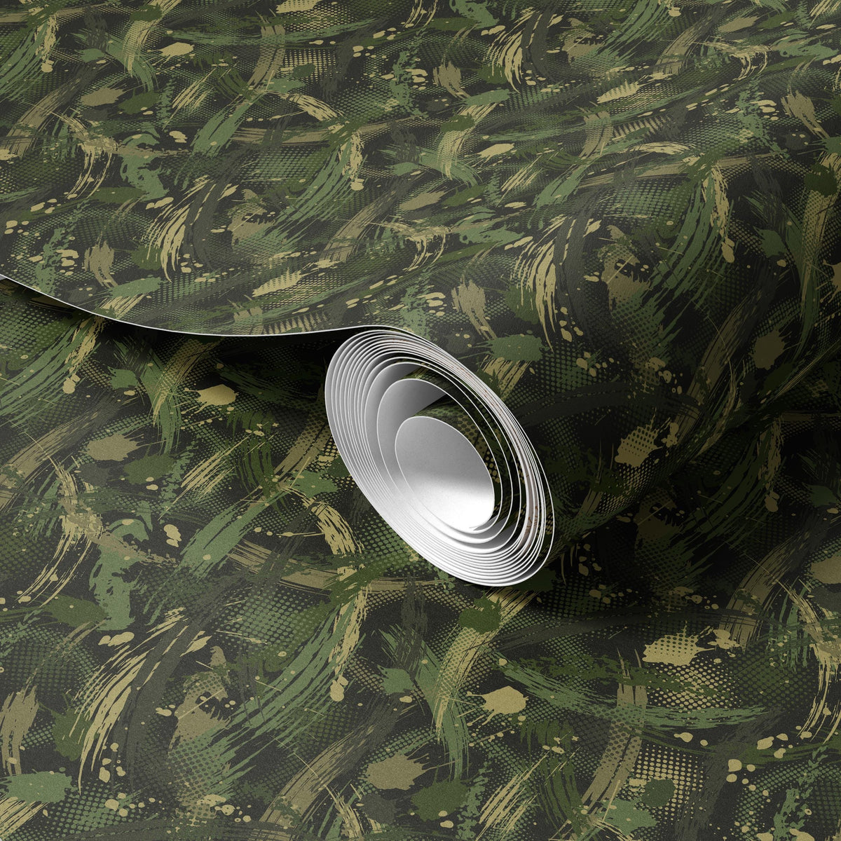 a roll of camouflage-patterned wallpaper or paper, with a white circular object placed on top of it.