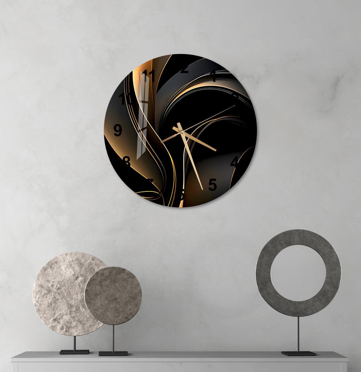 a black and gold clock on a white wall