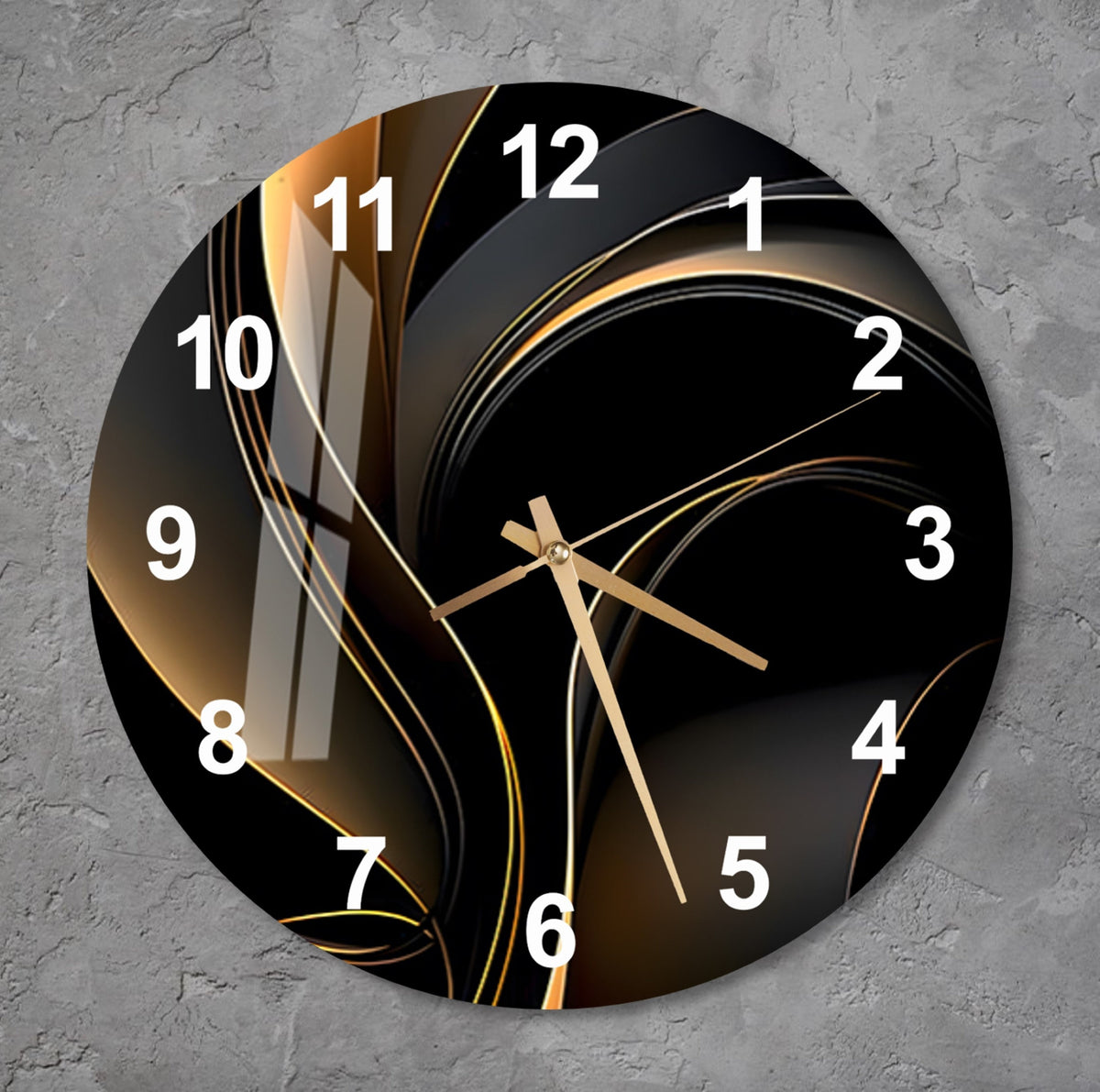 a black and gold clock on a gray wall
