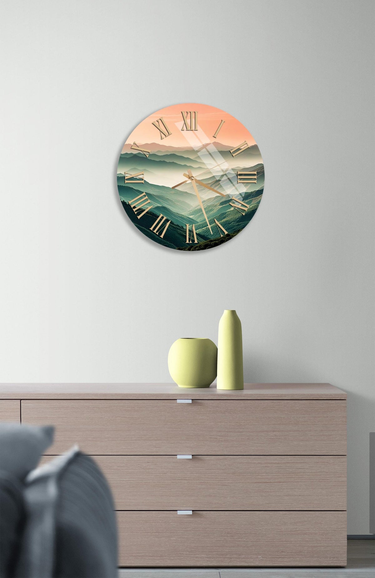 a clock on a wall above a dresser