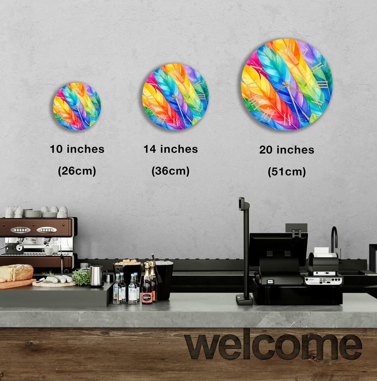 a counter with a cash register, and there are three different sizes of colorful, abstract paintings displayed on the wall above the counter.