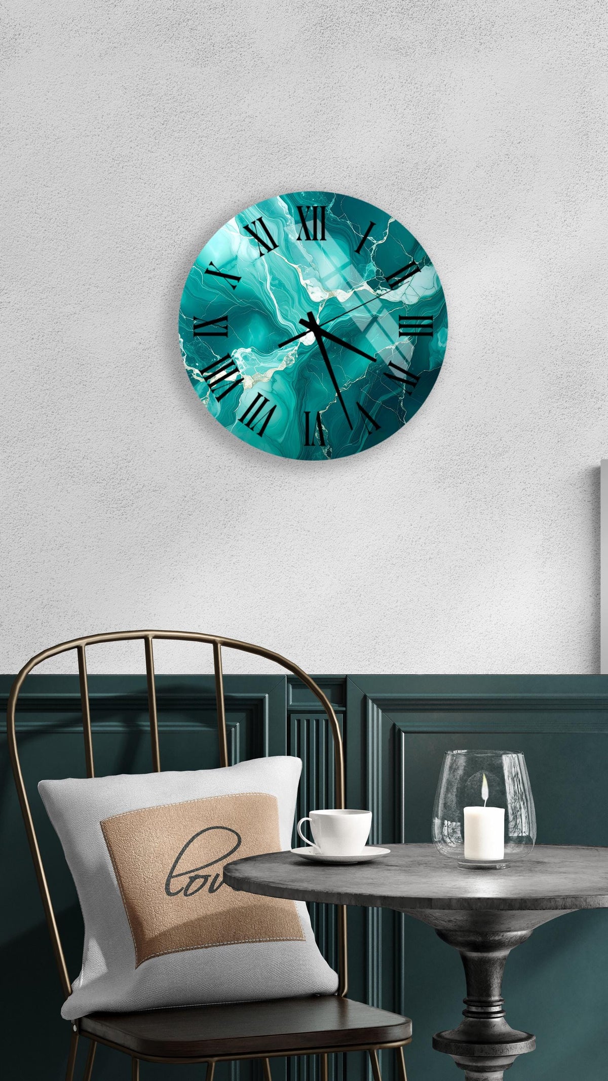 a modern and stylish interior design with a round wall clock displaying a turquoise marble pattern, a white table with a candle, and a black metal chair with a white pillow.