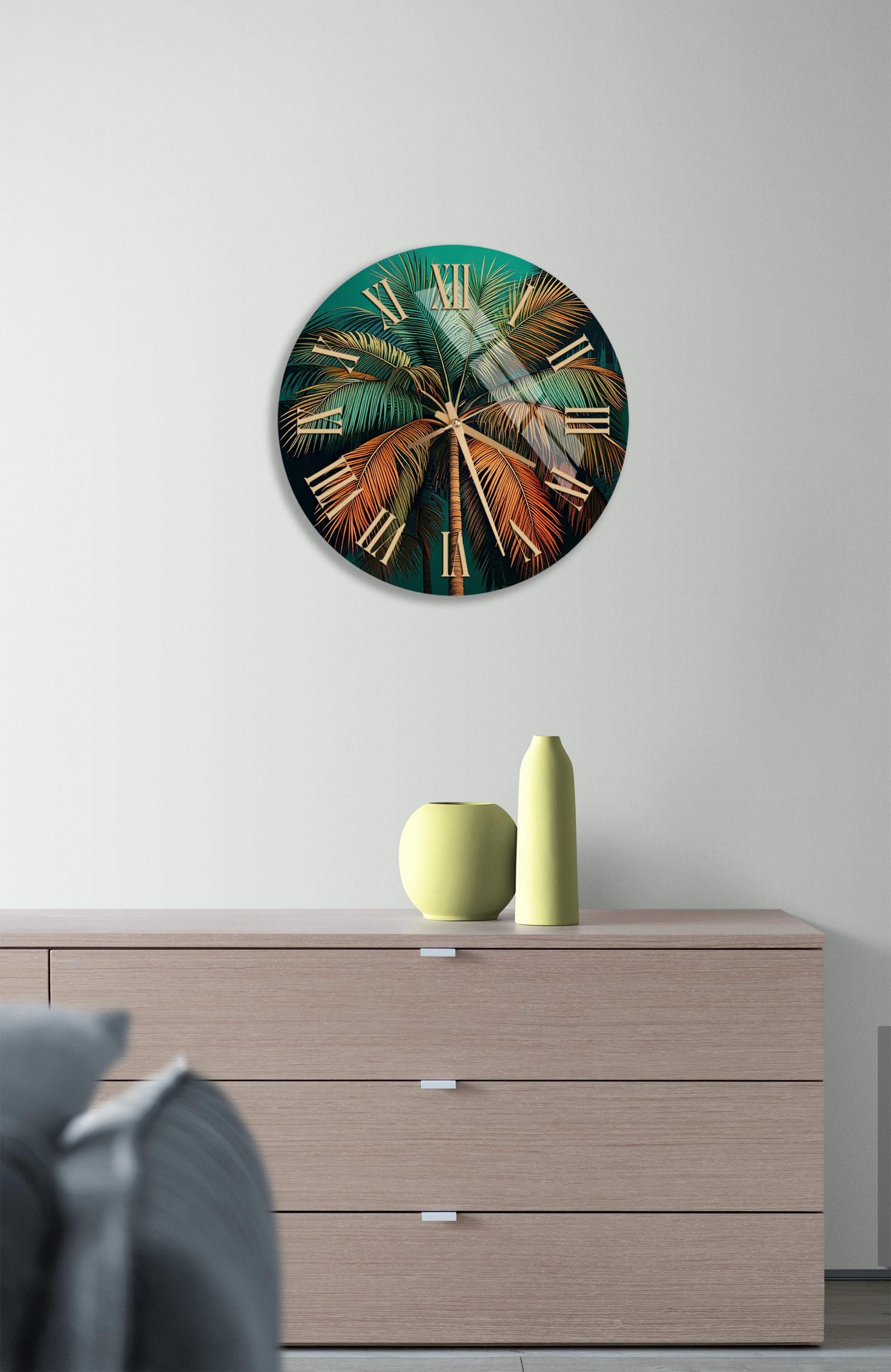 a wall clock with a tropical design on it