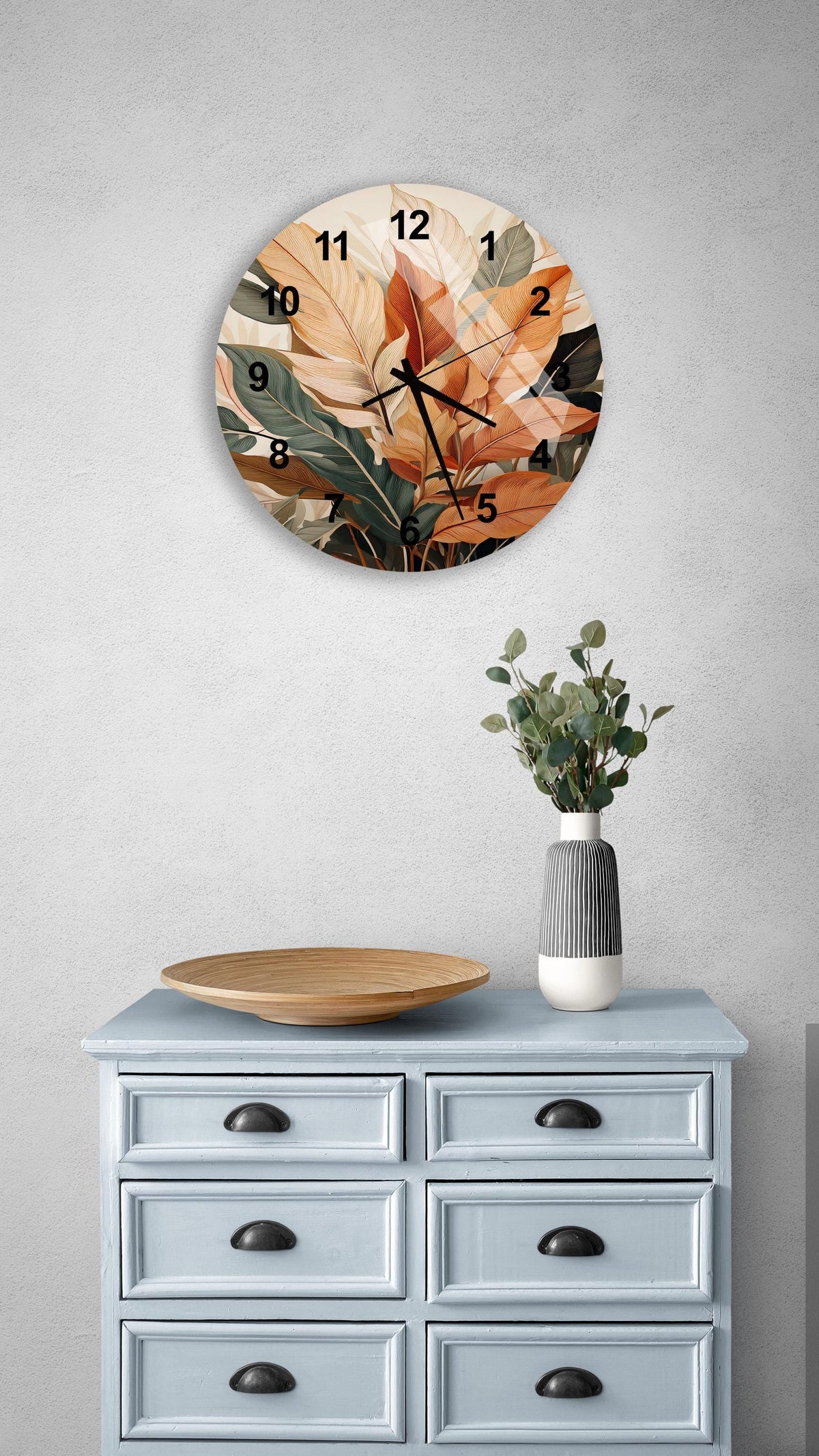 a clock on a wall above a dresser