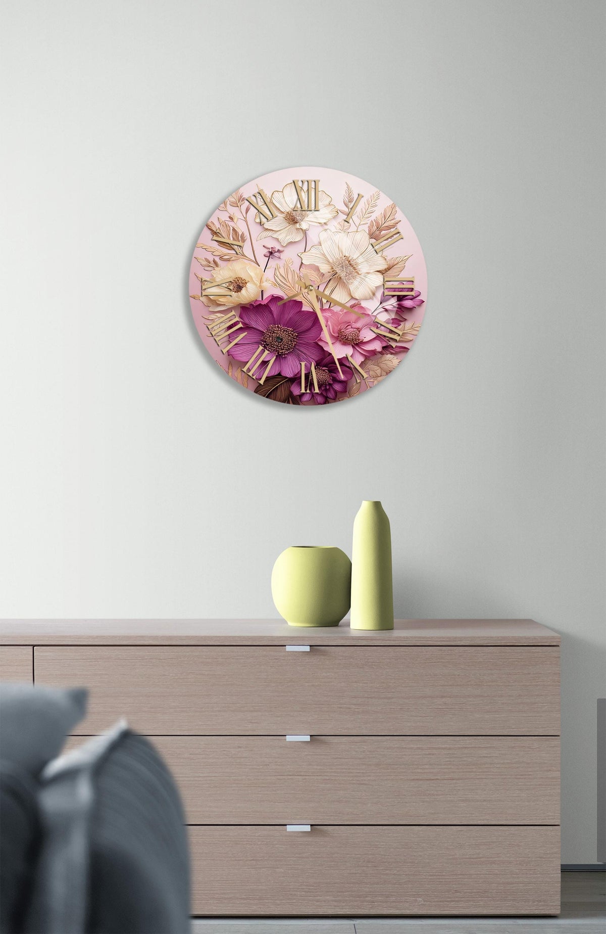 a clock on a wall above a dresser