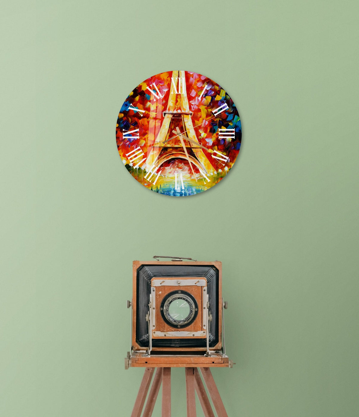 a picture of the eiffel tower on a wall