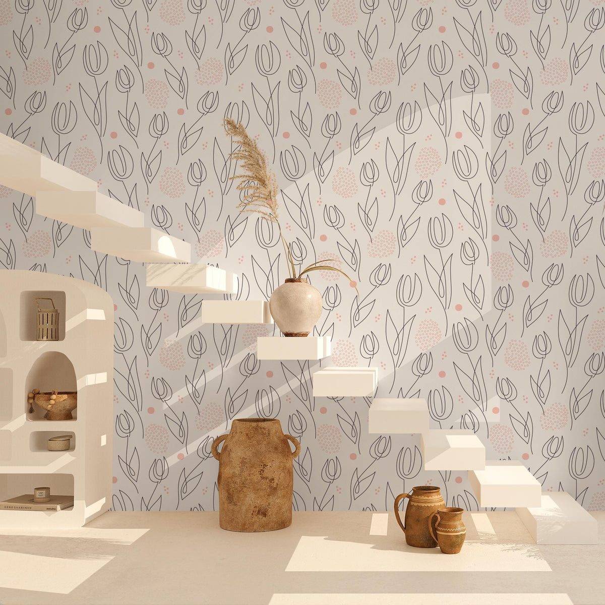 a minimalist and modern interior design with a floral pattern on the wall, white shelves, and various decorative items such as a vase, a pitcher, and a potted plant.
