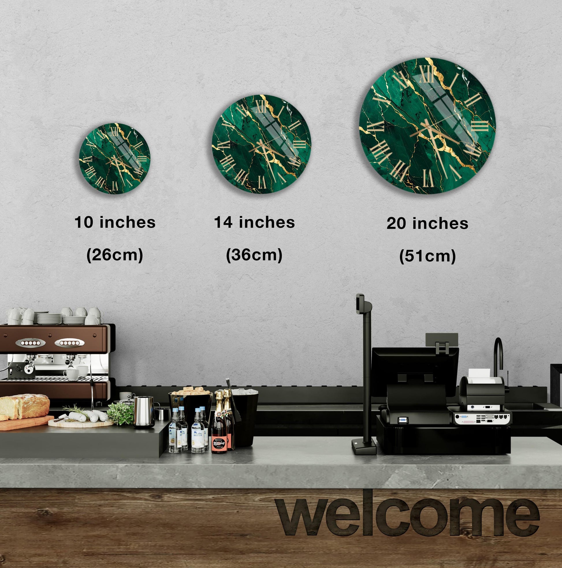 a wall with three clock designs, each representing a different size: 10 inches, 14 inches, and 20 inches. Below the clocks, there is a counter with various items such as bottles and a cash register. The word "welcome" is also visible in the image.