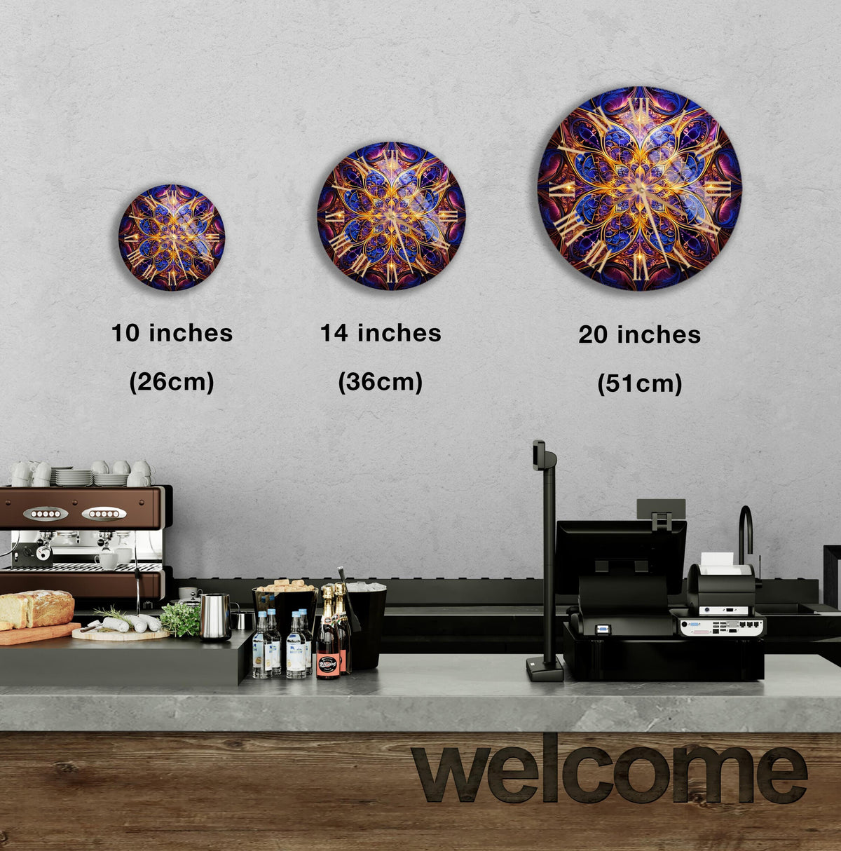 a kitchen counter with three clocks on the wall above it