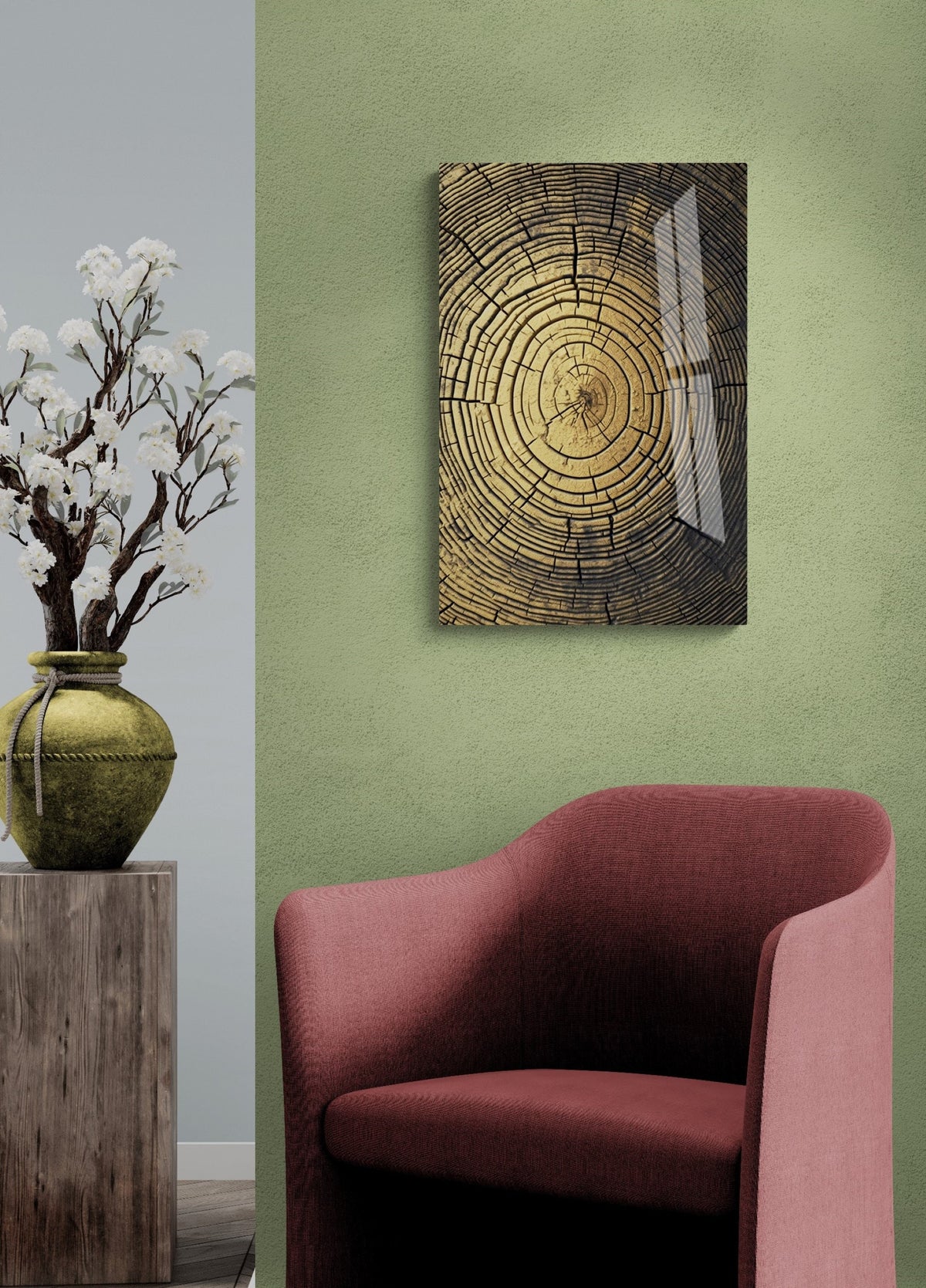 a green room with a red chair and a painting on the wall