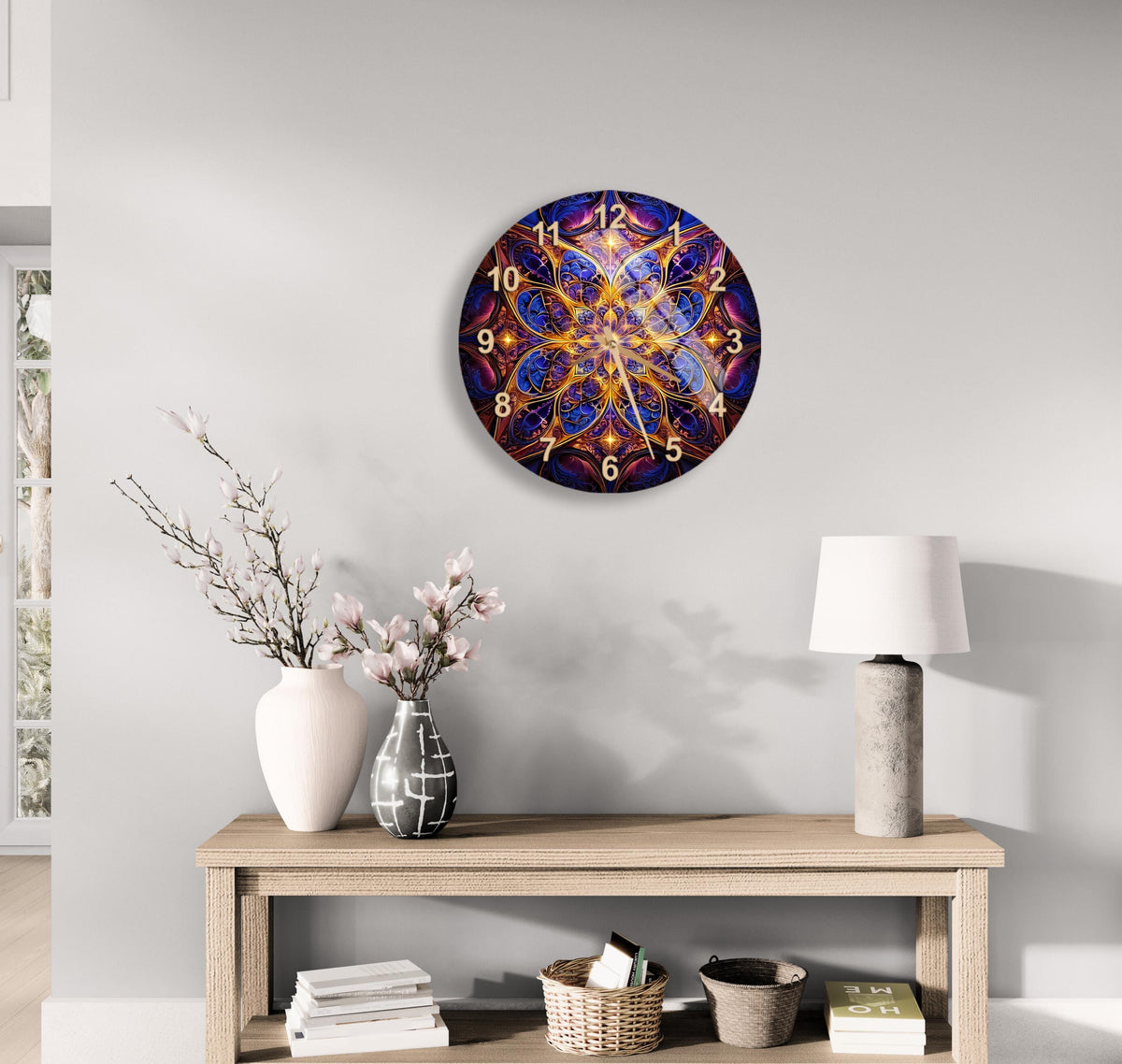 a table with a vase of flowers and a clock on the wall