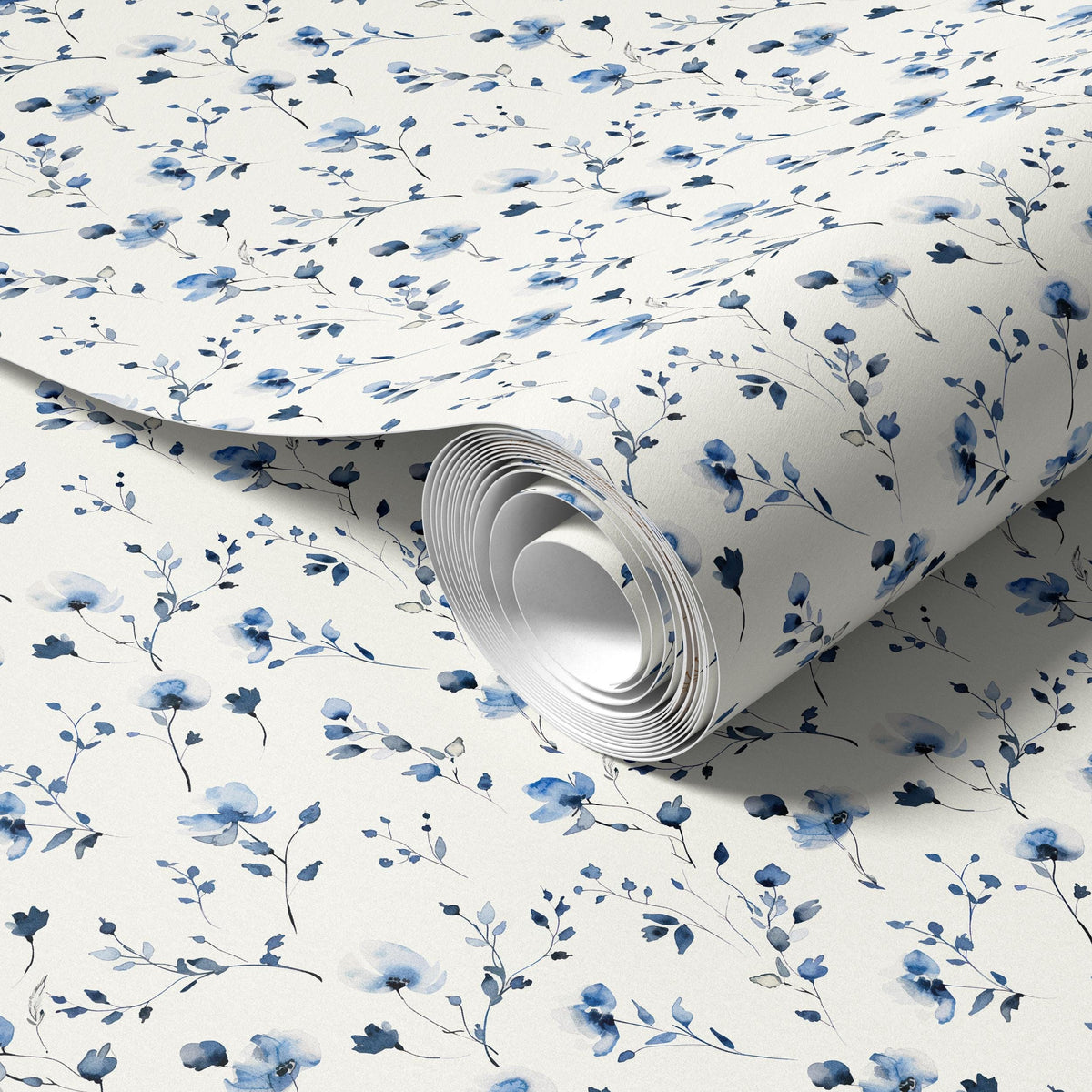 a roll of wallpaper with a blue floral pattern.