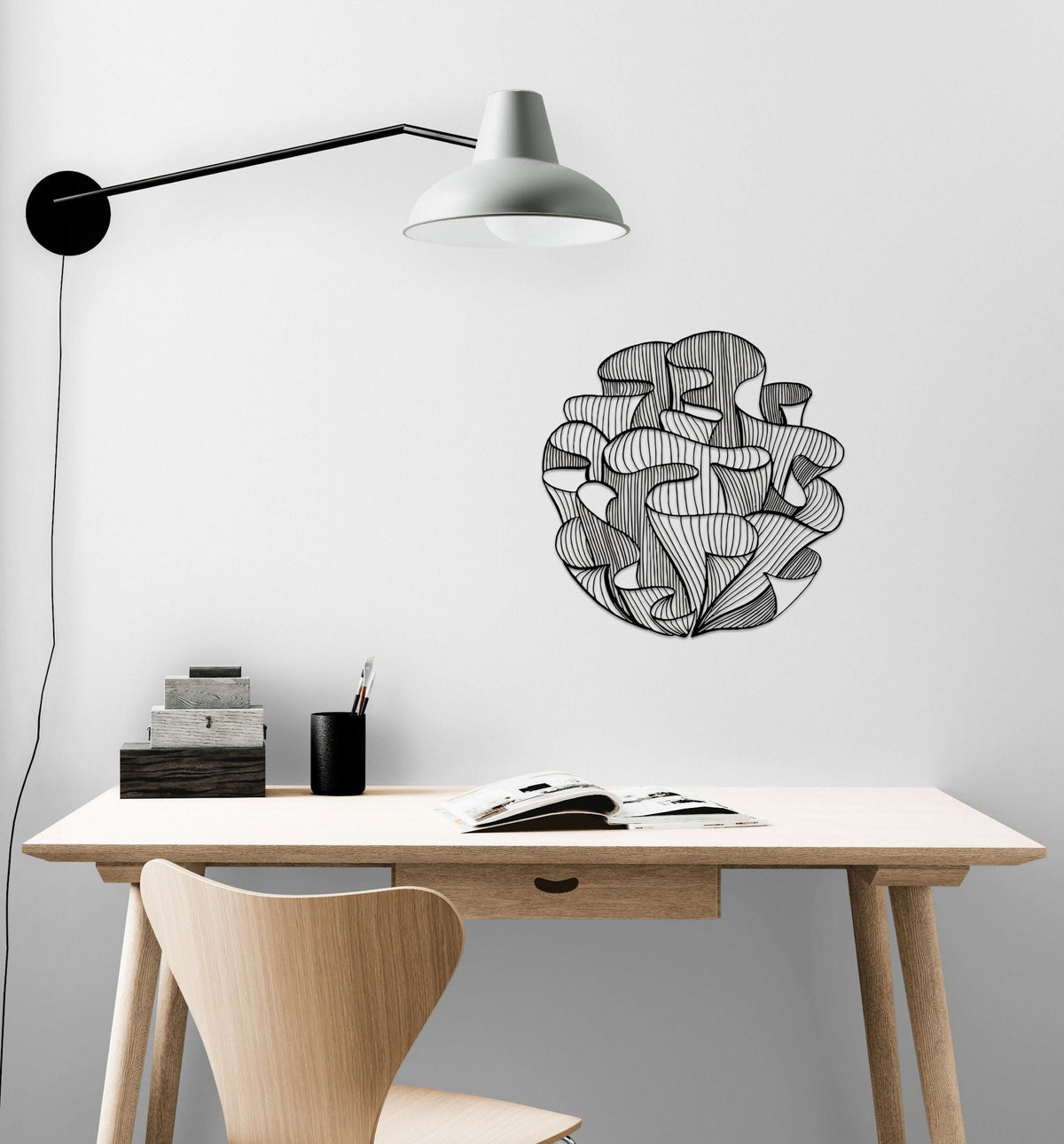 a desk with a chair and a lamp on it