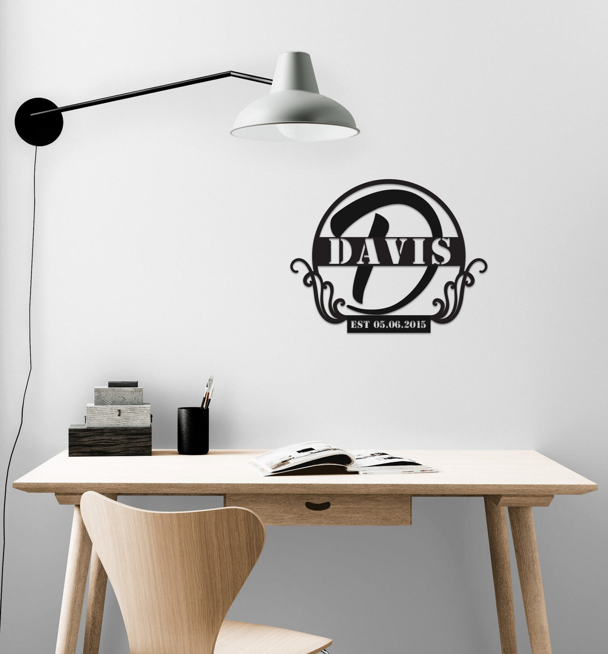 a desk with a chair and a lamp on it