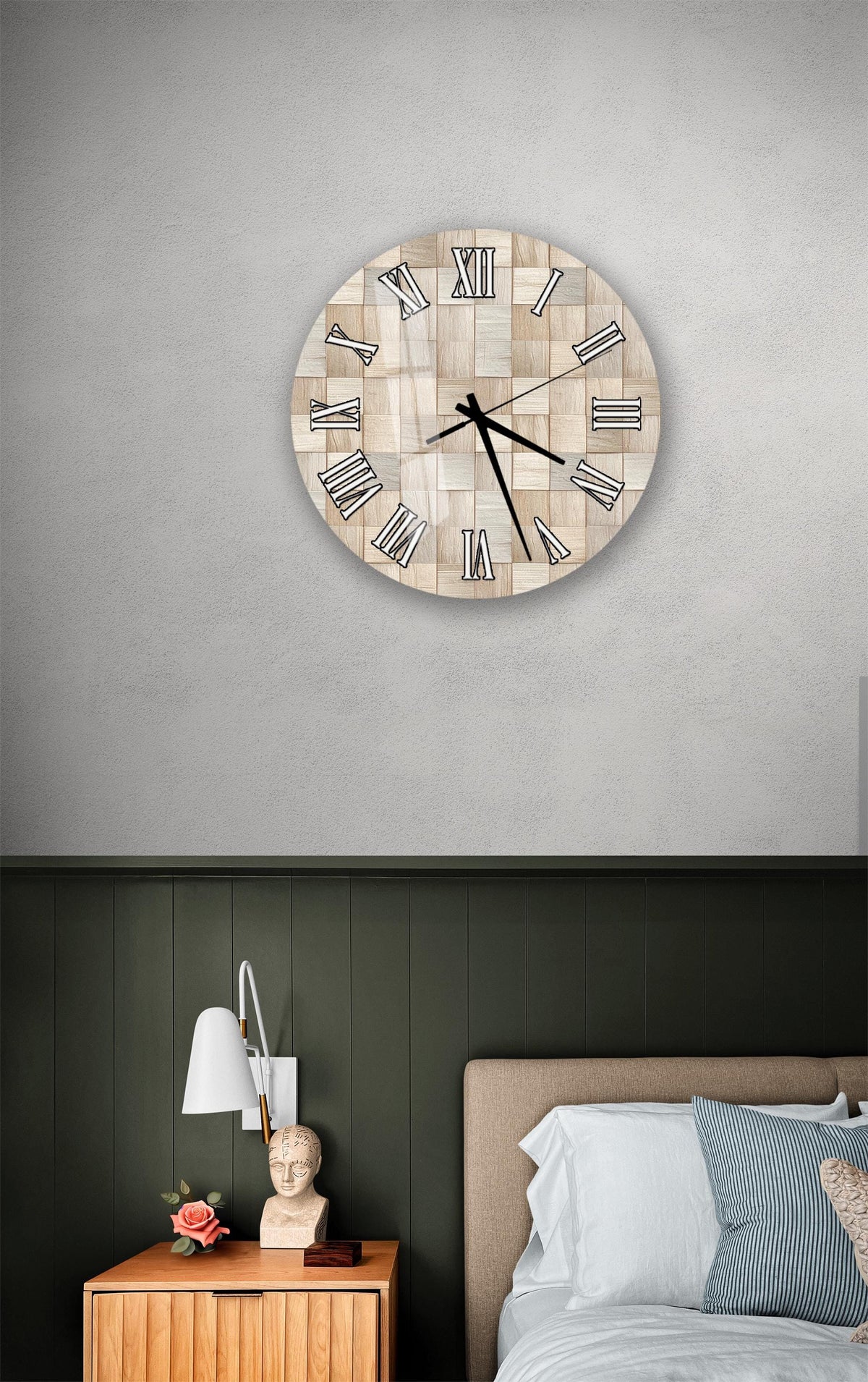 a bedroom setting with a wooden clock on the wall above a bed.
