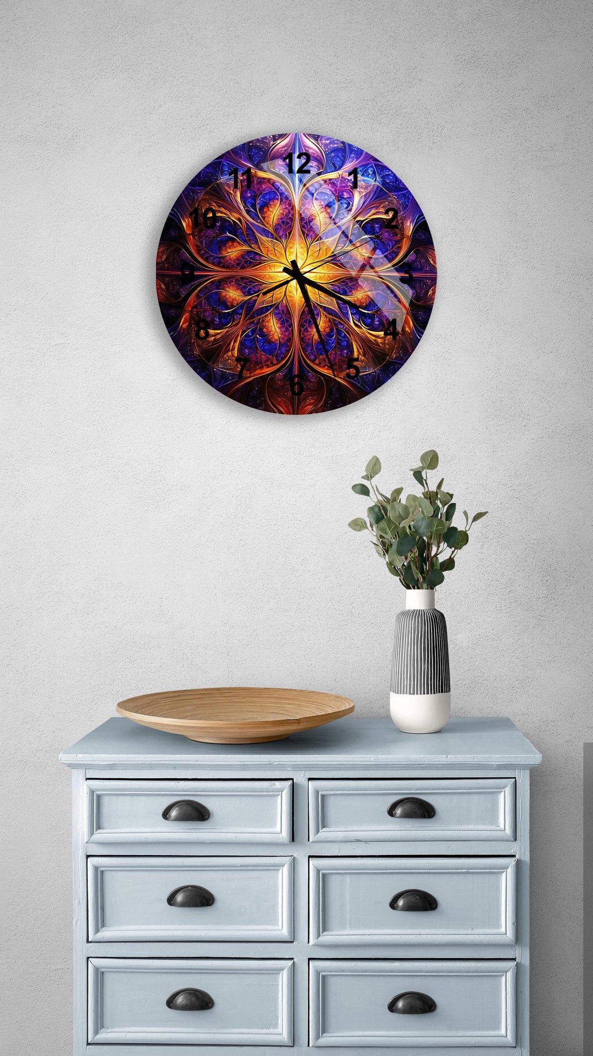 a clock on a wall above a dresser