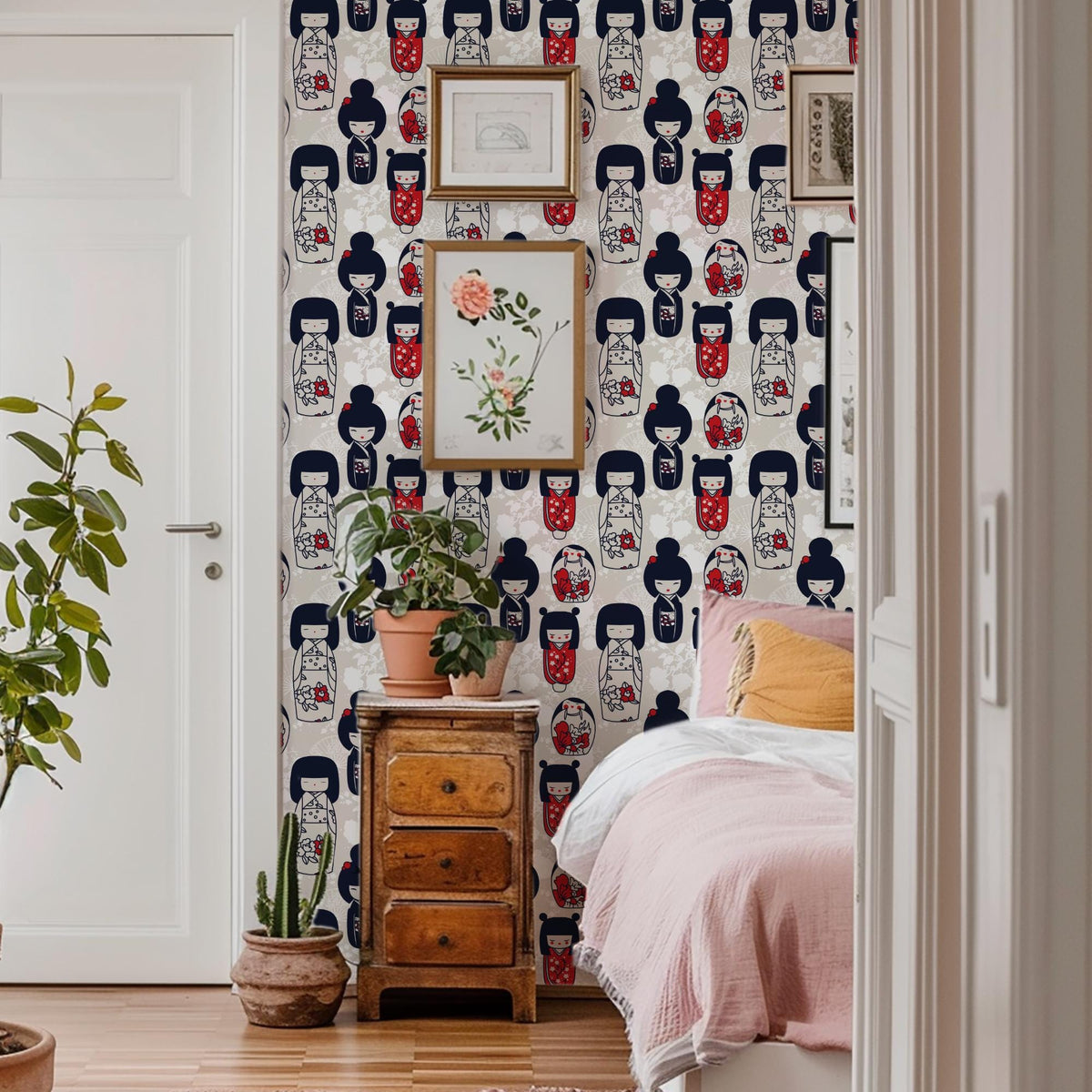 a bedroom with a bed, a wooden dresser, and a wall with a repeating pattern of geisha dolls. The room has a cozy and eclectic atmosphere, with various decorative elements such as potted plants and artwork.