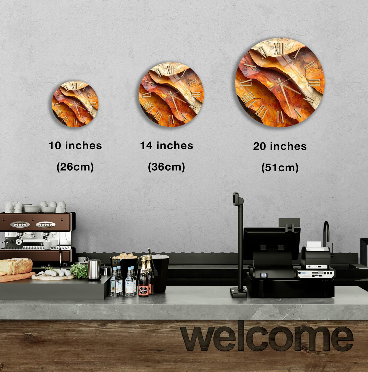 a counter in a restaurant with a welcome sign, and there are three clock-like designs on the wall, each representing a different size of the same design.