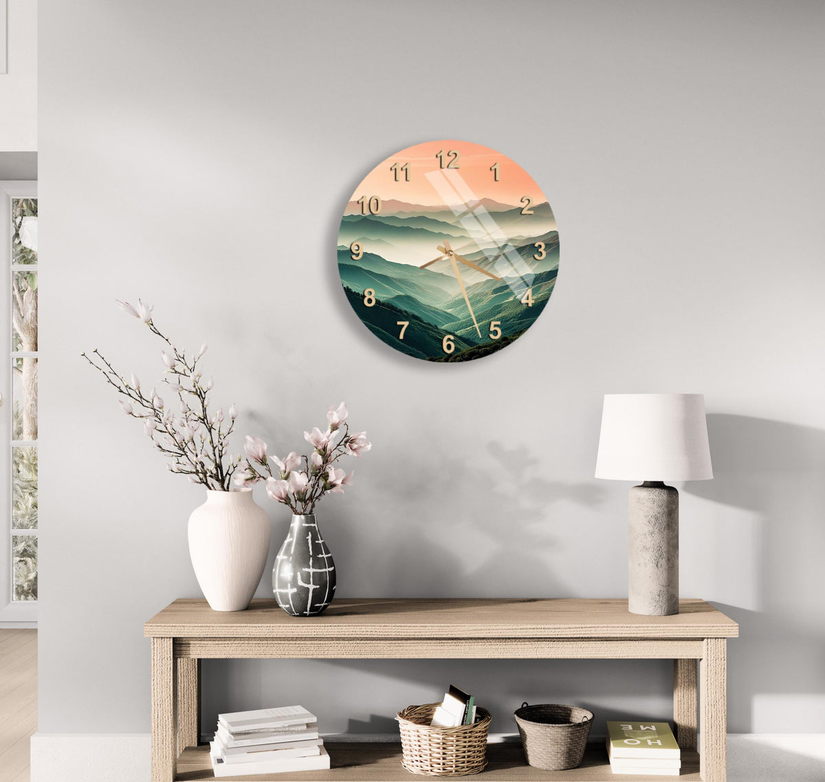 a clock on a wall above a table with a vase of flowers