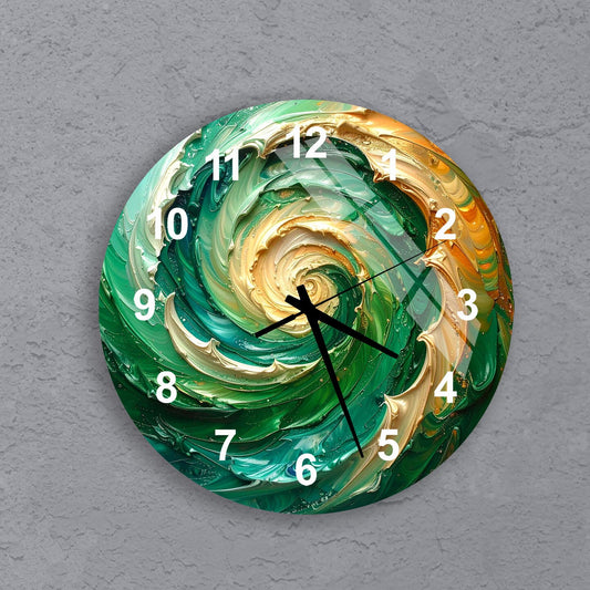 A wall clock with a swirling, abstract design in green, orange, and white colors.