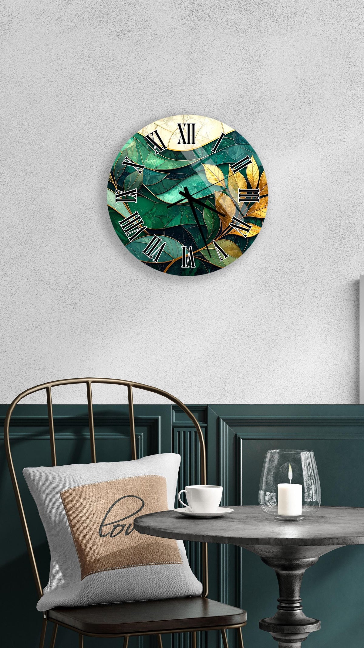 a modern, round wall clock with a green and yellow abstract design, mounted on a white wall above a dining table with a white tablecloth.