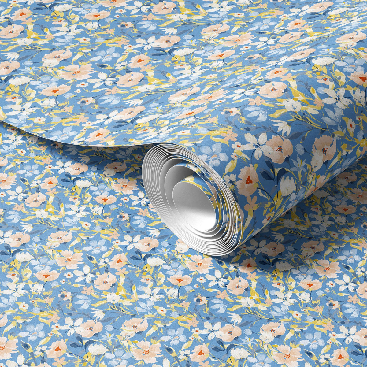 a roll of blue and white floral patterned wallpaper.