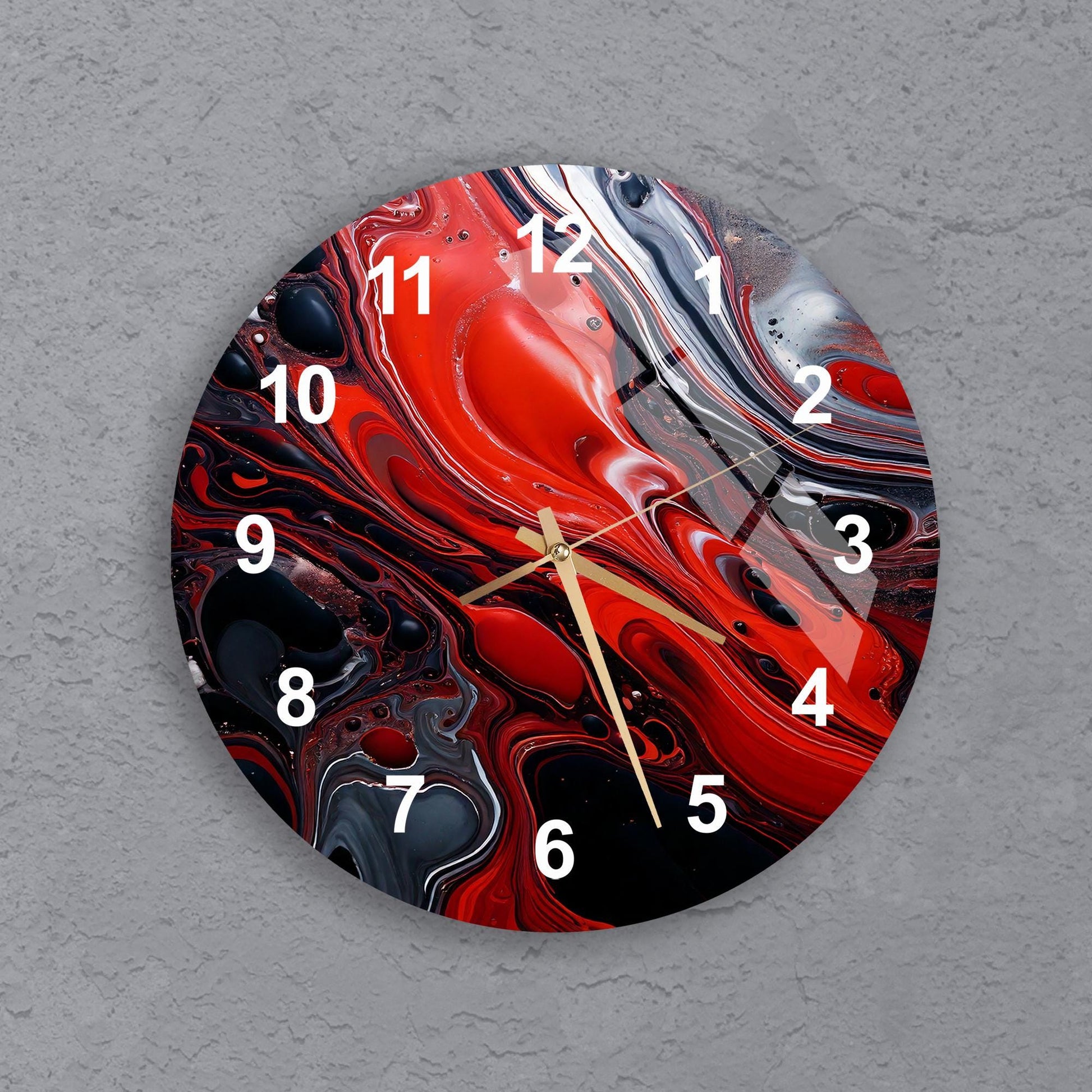 a clock with a red and black design on it