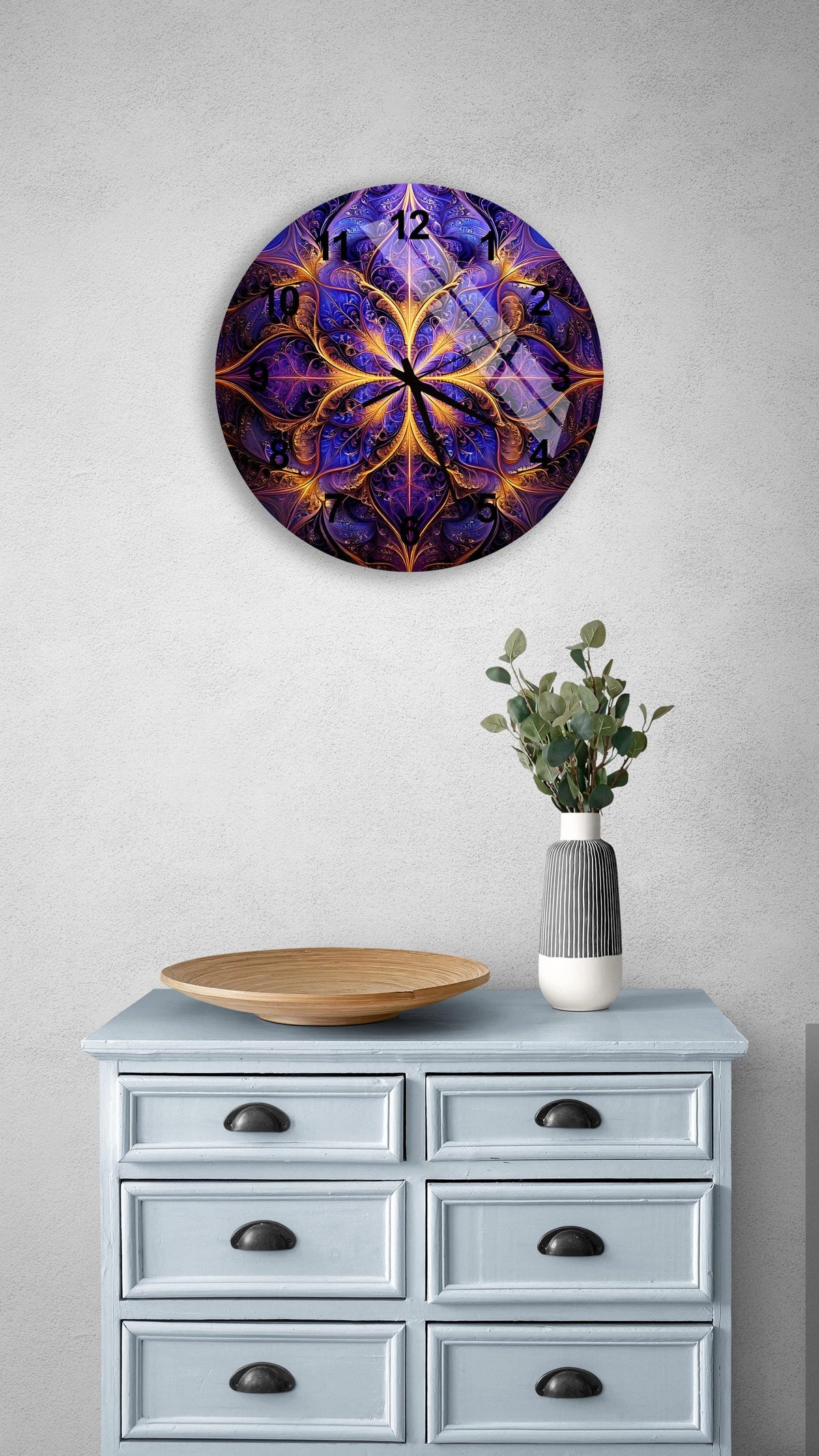 a blue dresser with a wooden bowl on top of it