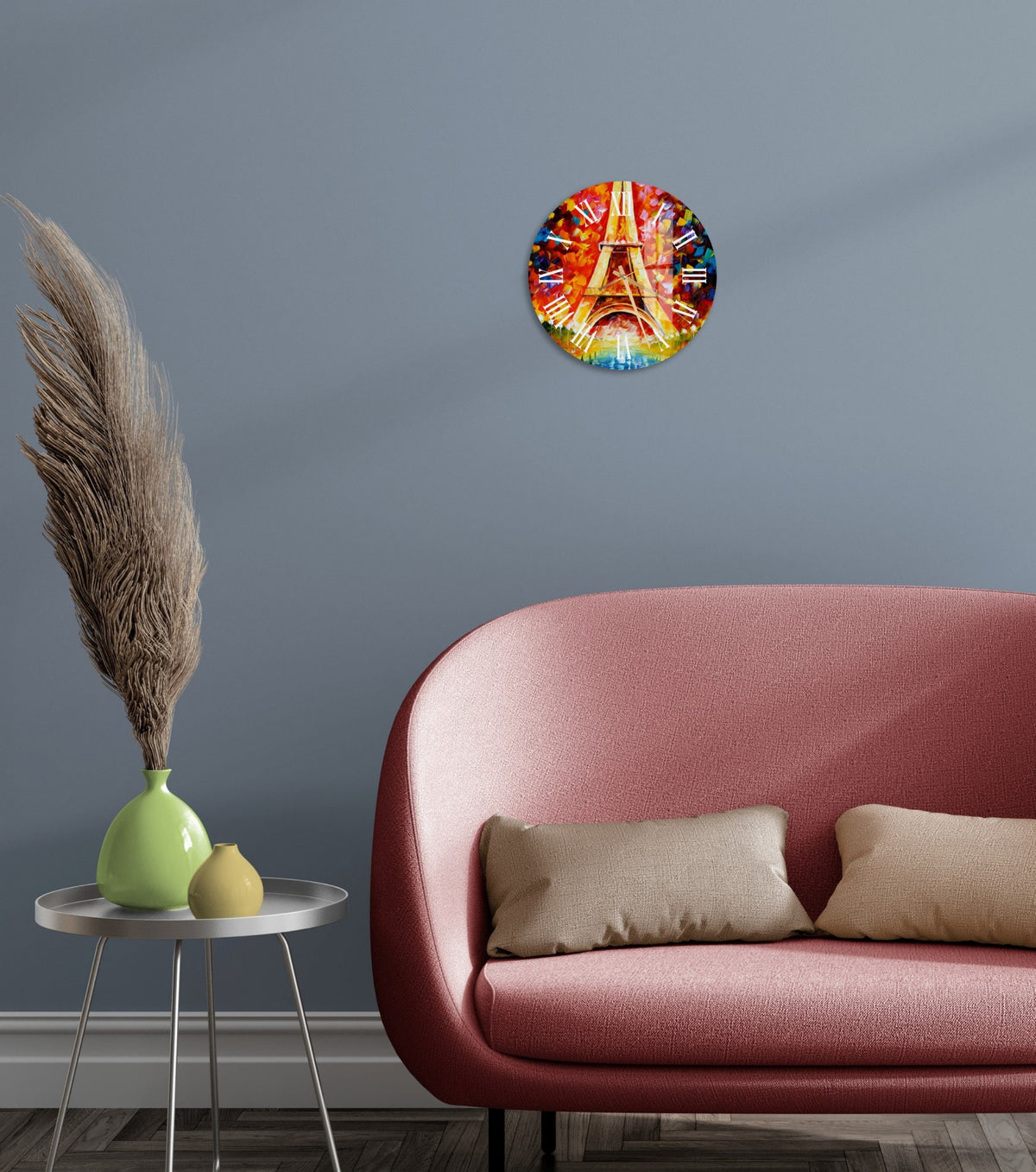 a living room with a pink couch and a clock on the wall