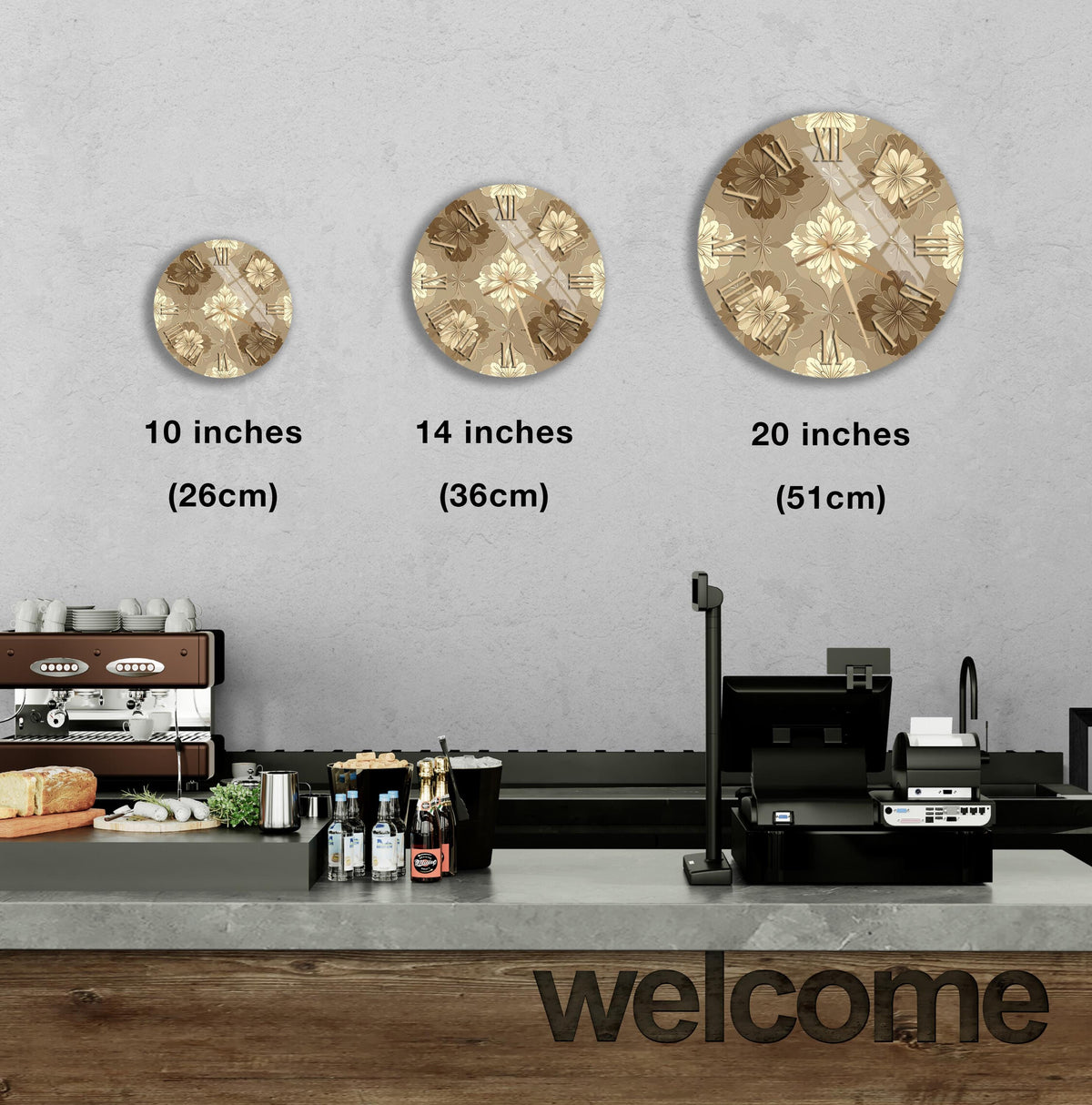 a counter in a restaurant with a "welcome" sign, and three clock-like designs on the wall, each representing a different size.