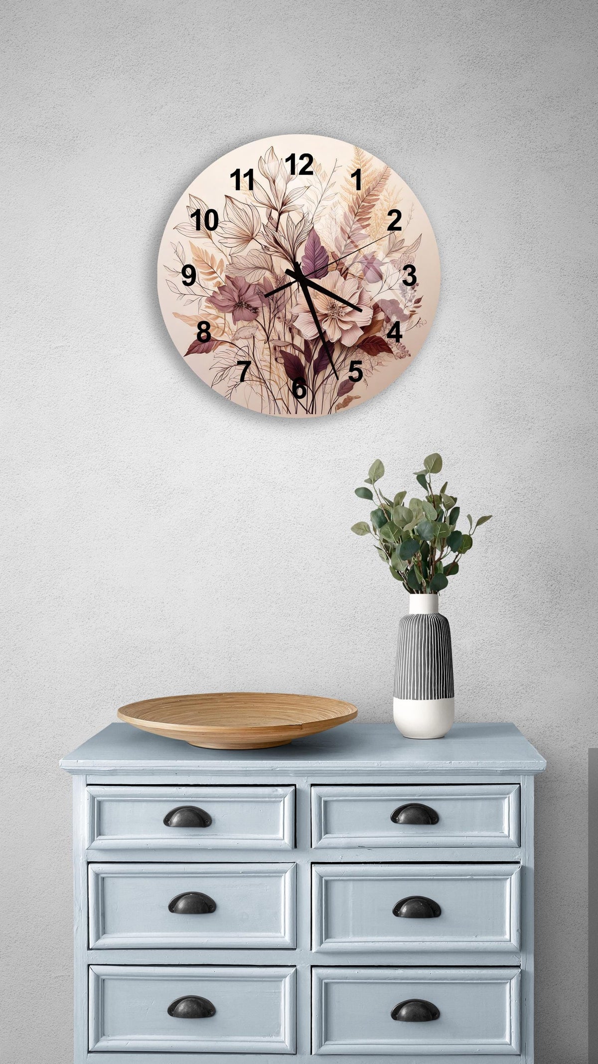 a clock on a wall above a dresser
