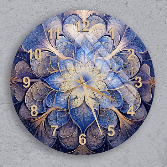 a blue and gold clock on a gray wall