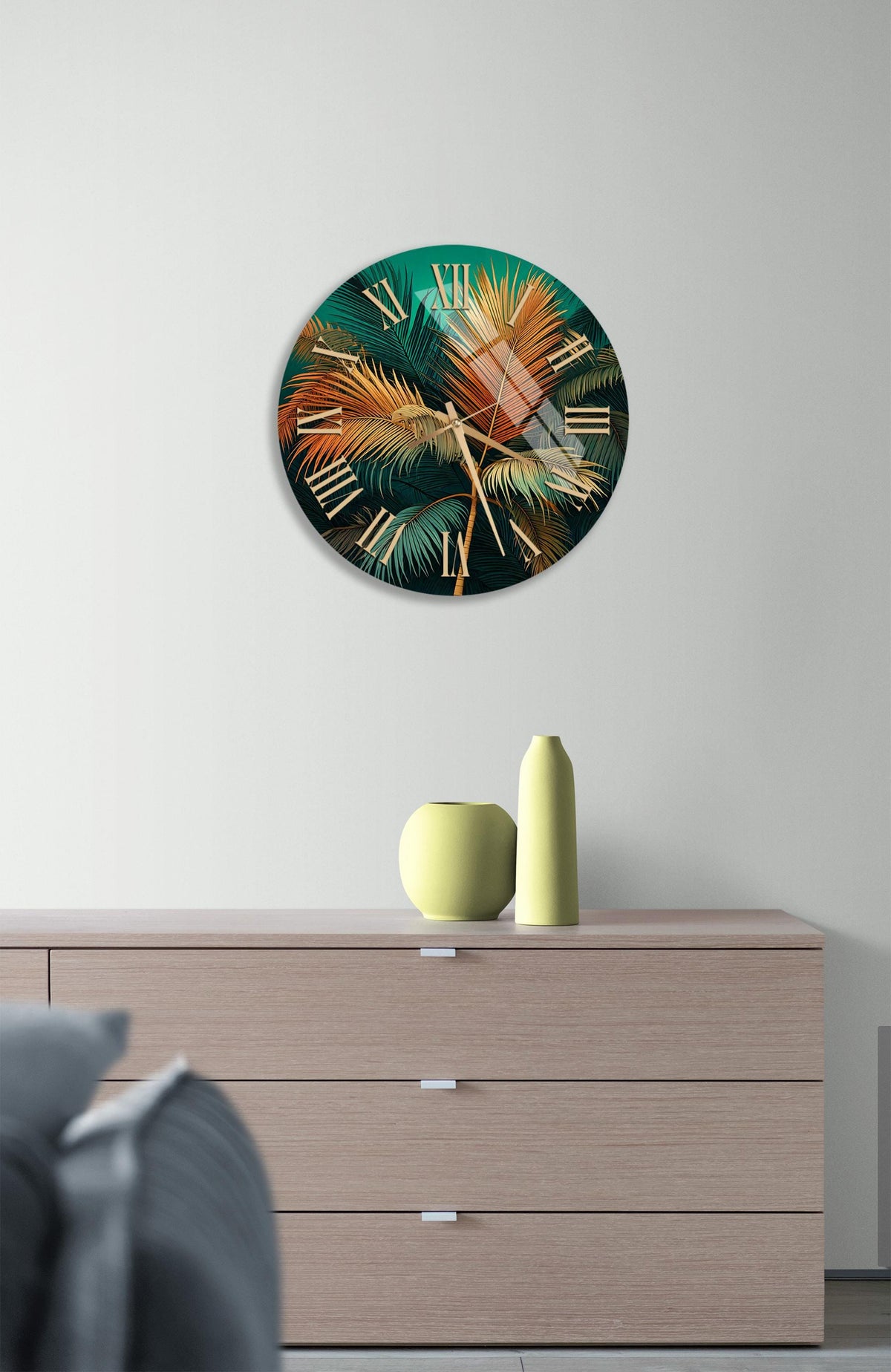 a clock with a green and orange design on it