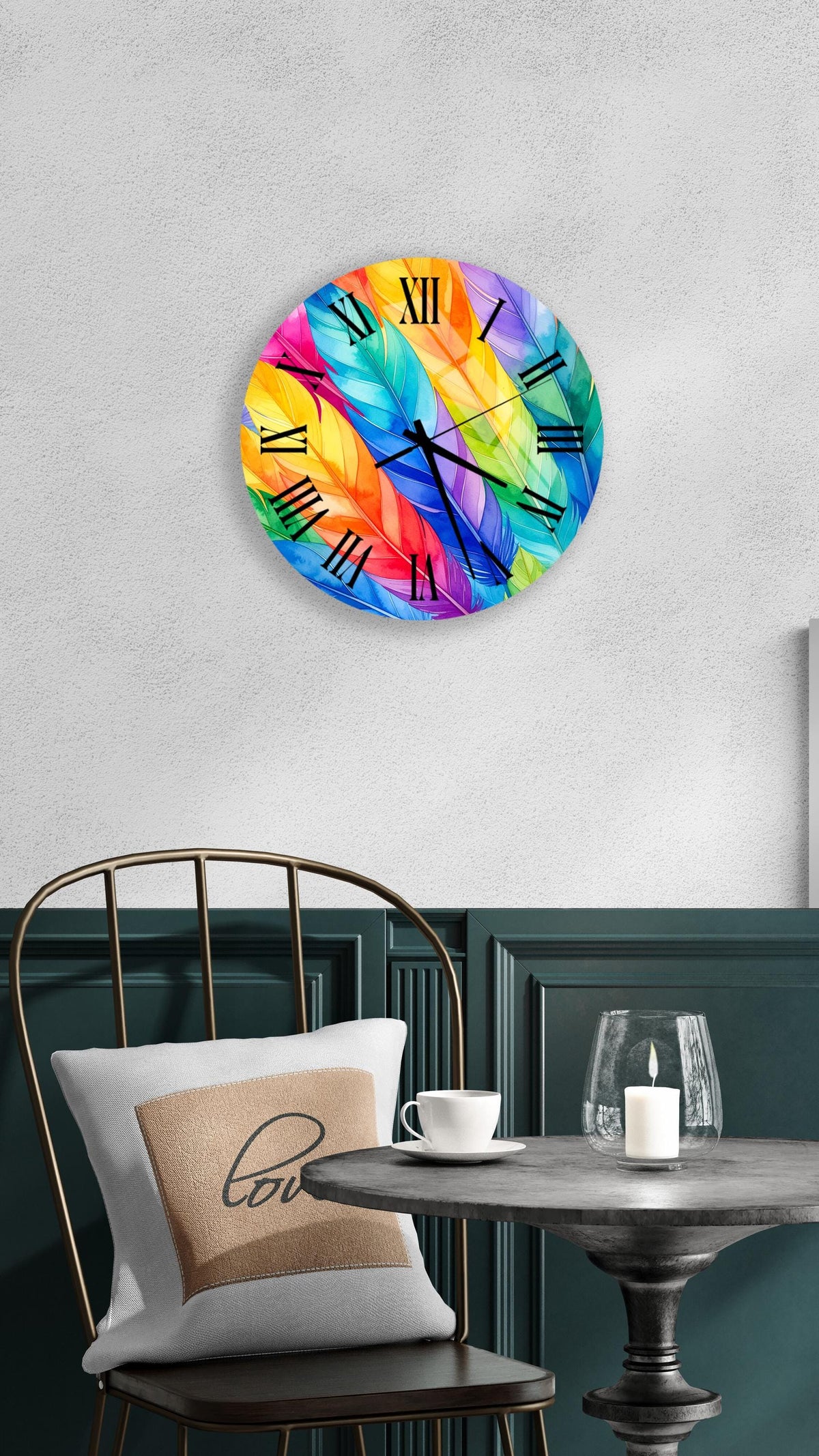 a round wall clock with a vibrant feather design, mounted on a wall above a table with a white tablecloth.
