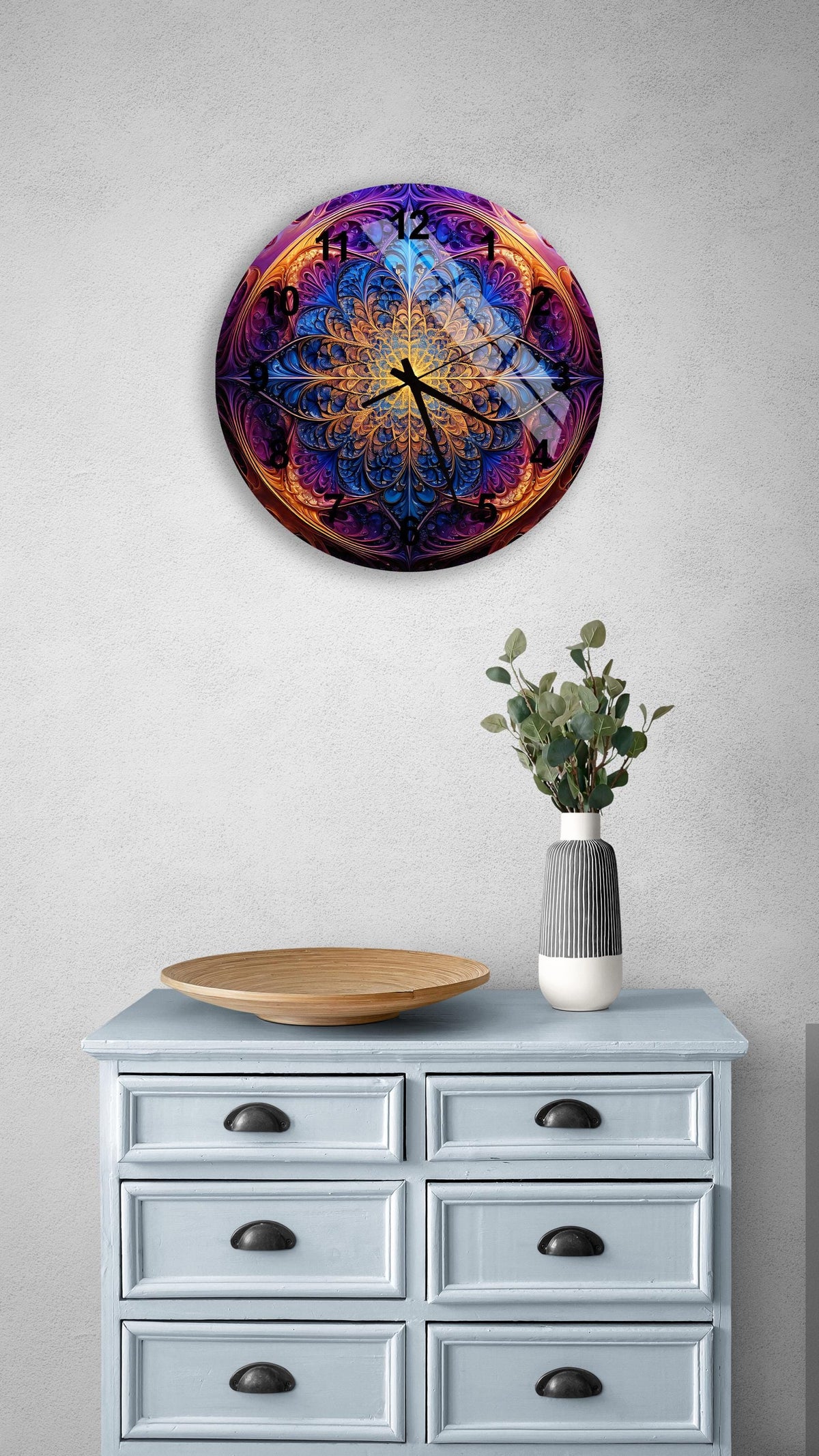 a clock on a wall above a dresser