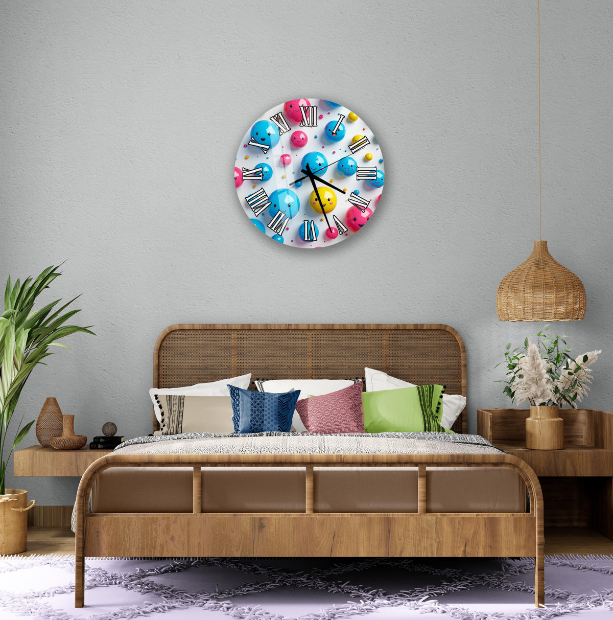 a bedroom with a large, colorful clock on the wall above a bed with a wooden headboard. The room has a neutral color scheme with a few decorative elements, such as potted plants and vases.