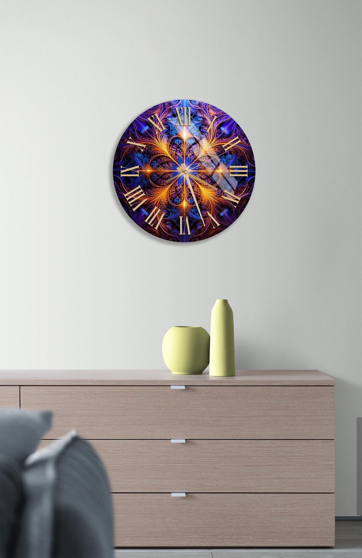 a large clock on a wall above a dresser